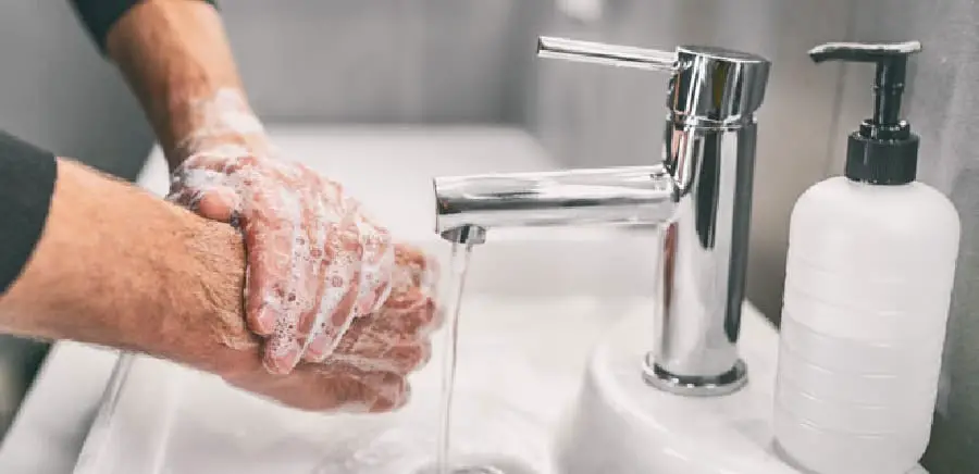 2. Use a dish soap to scrub your hands clean.