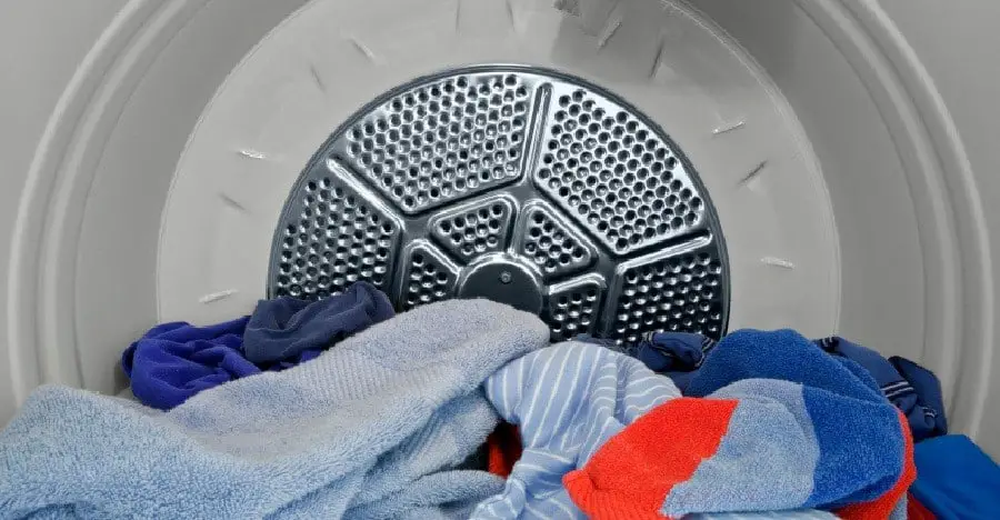 3. Wash the clothes with detergent, then dry them in the dryer on high heat.