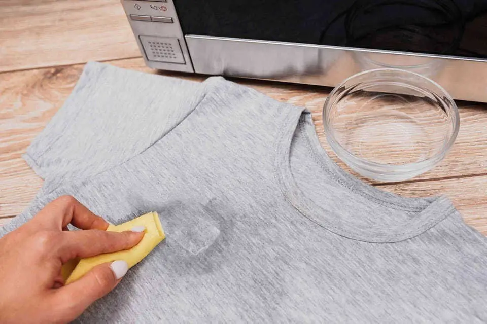 How to remove adhesive from clothing stickers